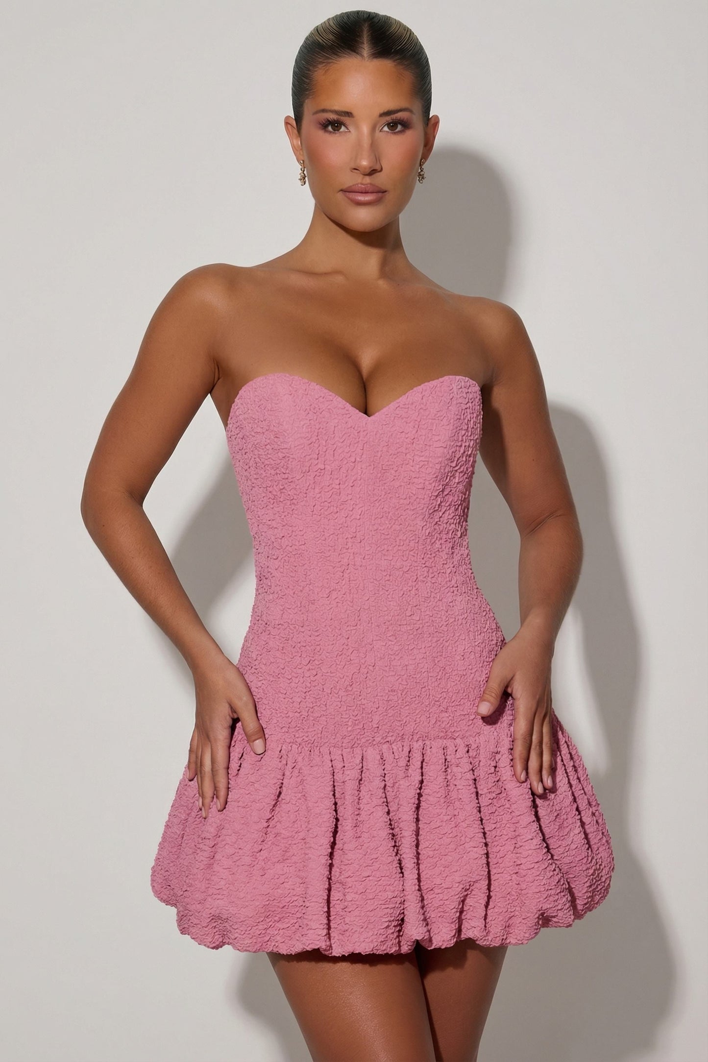 Cut-Out Bubble Hem Corset Mini Dress in Dusty Pink