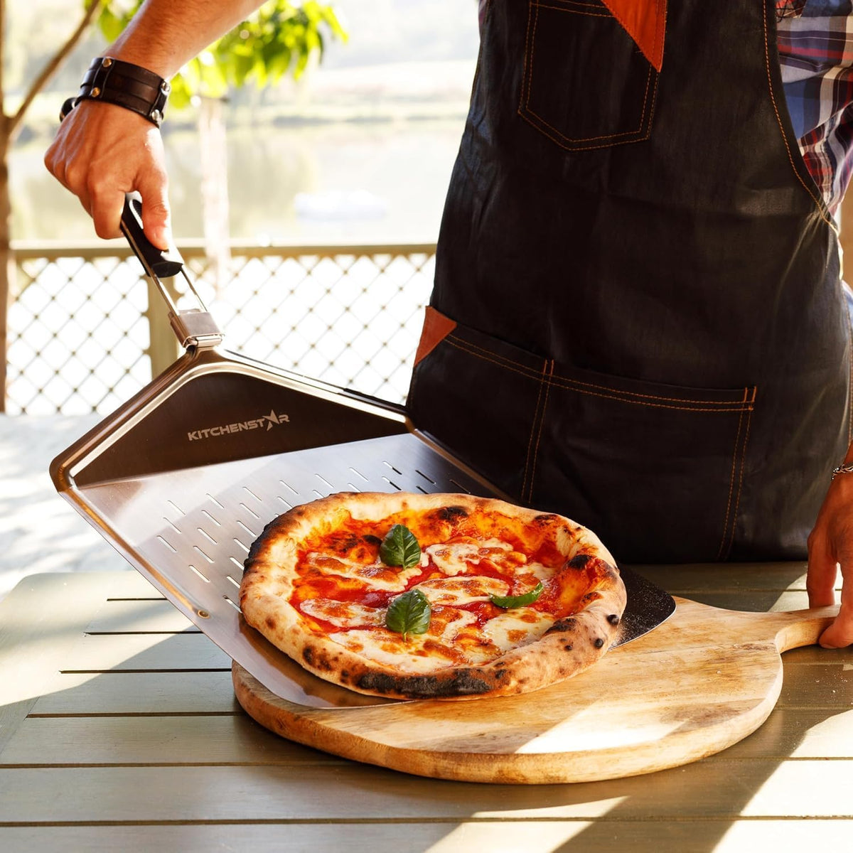 KitchenStar Perforated Pizza Peel 14 inch with 10 inch Folding Handle, Large - Stainless Steel Spatula Paddle for Effortless Pizza Transfer & Easy Storrage - Outdoor Pizza Oven Accessories