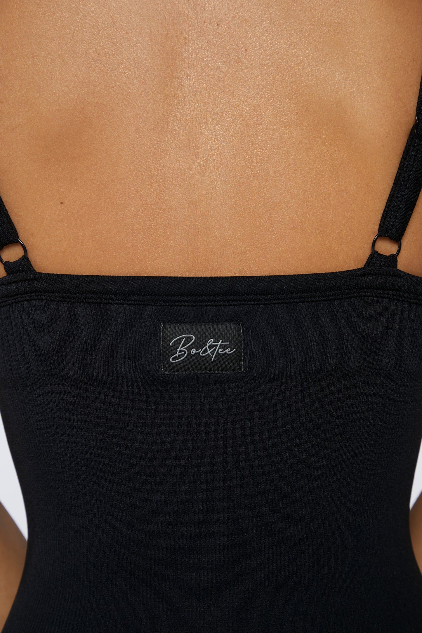 Seamless Micro Rib Scoop-Neck Unitard in Black