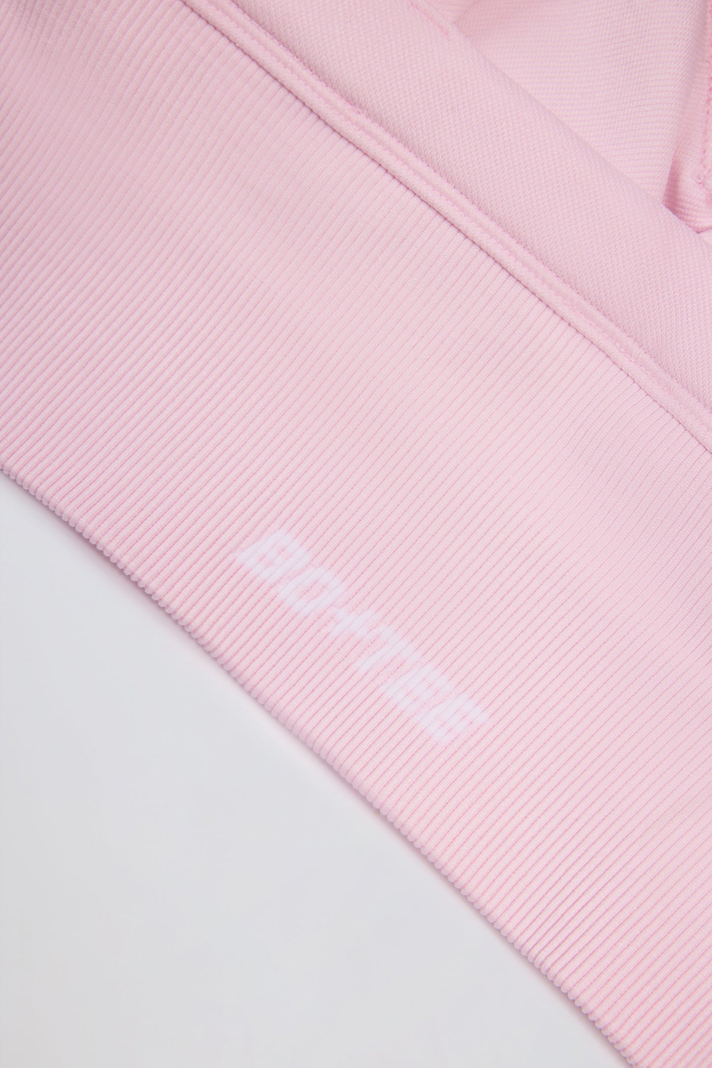 Super Sculpt Seamless Crossback Sports Bra in Powder Pink