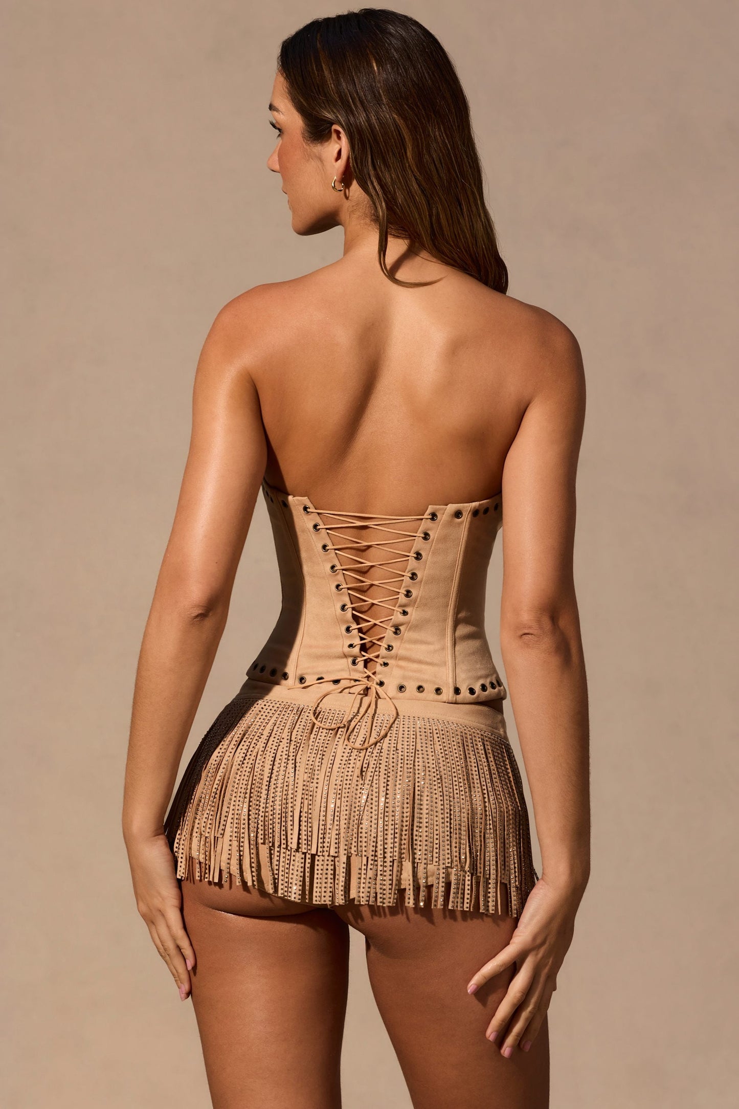 Fringed Low-Rise Mini Shorts in Tan