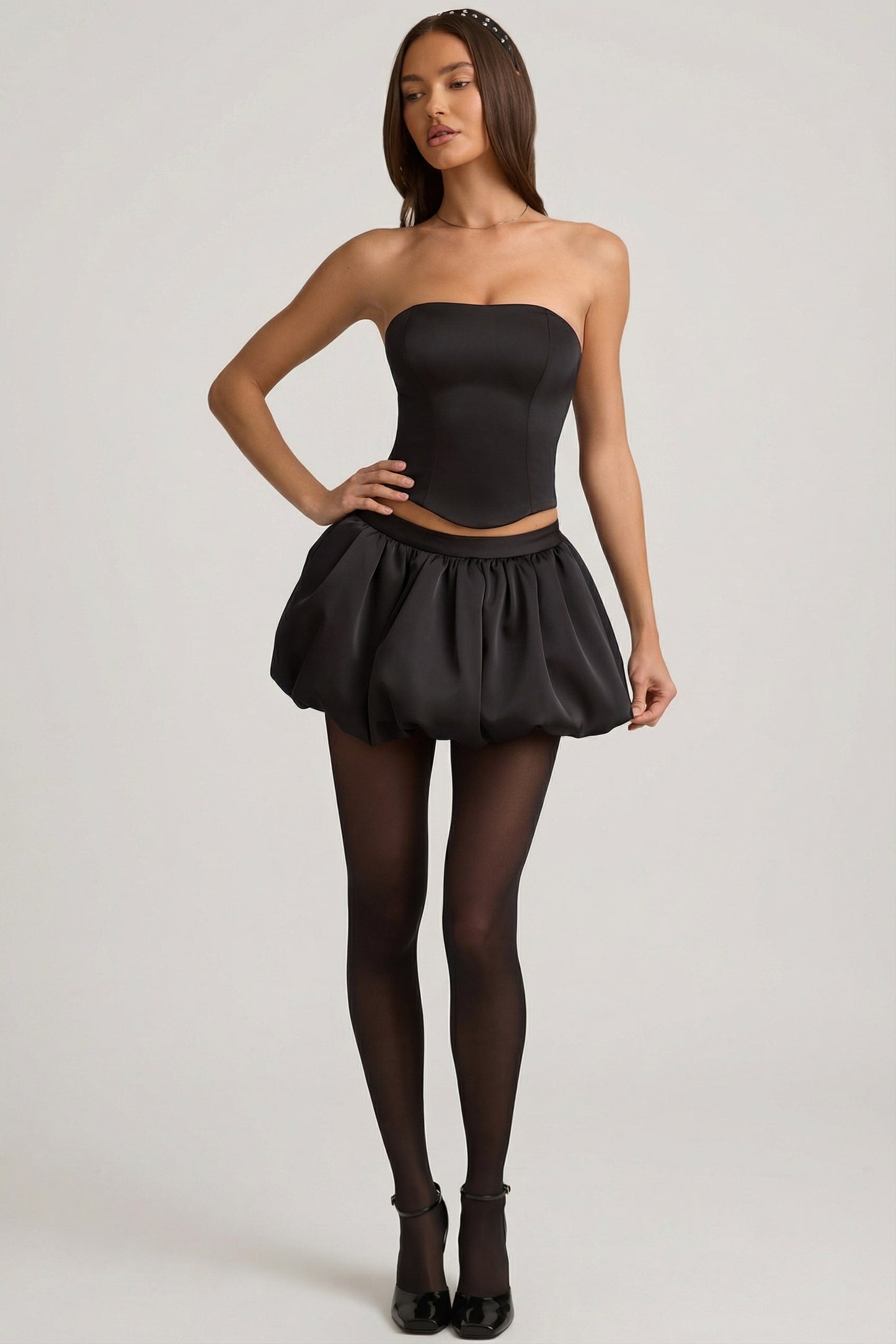 Bubble Hem Mid-Rise Mini Skirt in Black