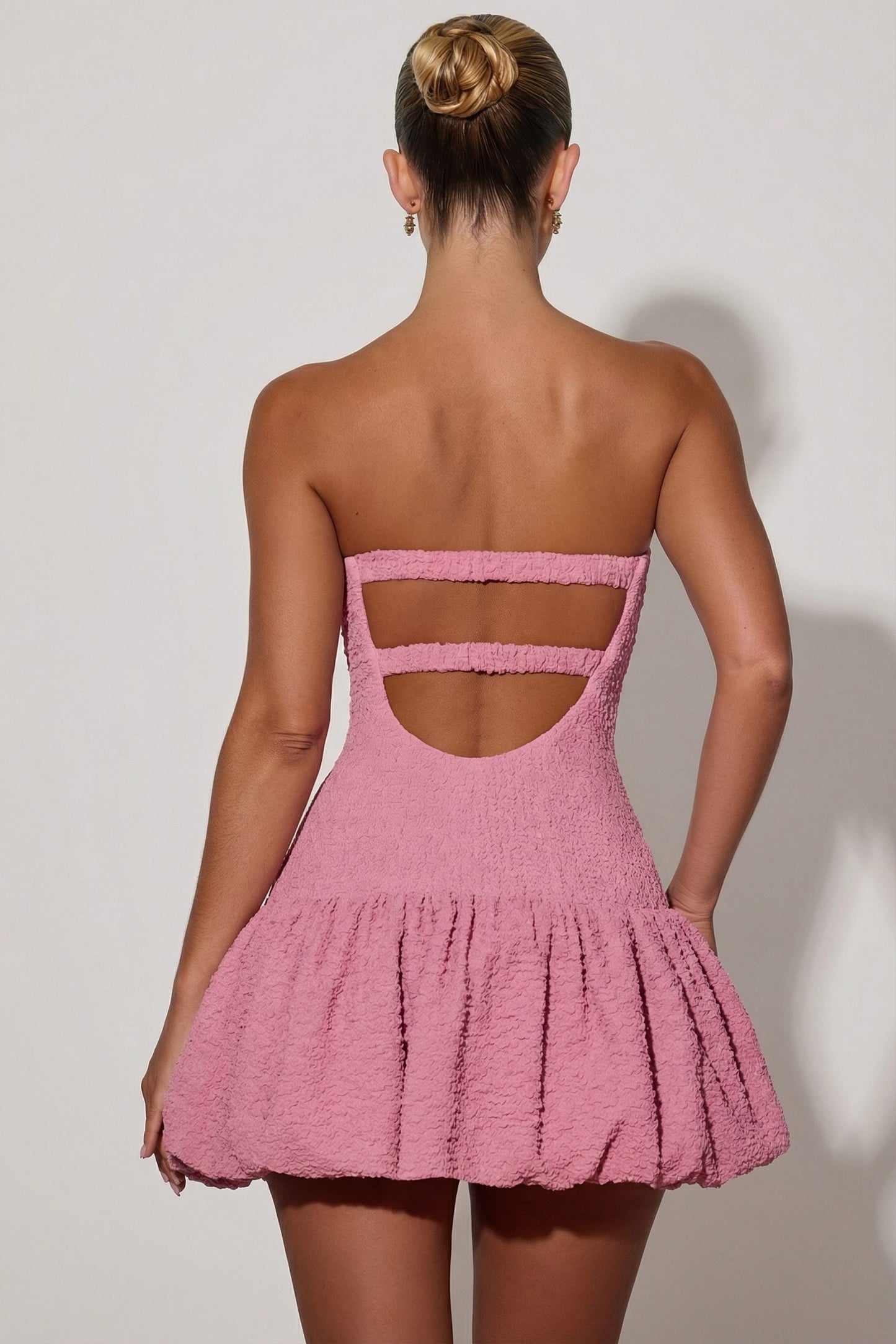 Cut-Out Bubble Hem Corset Mini Dress in Dusty Pink