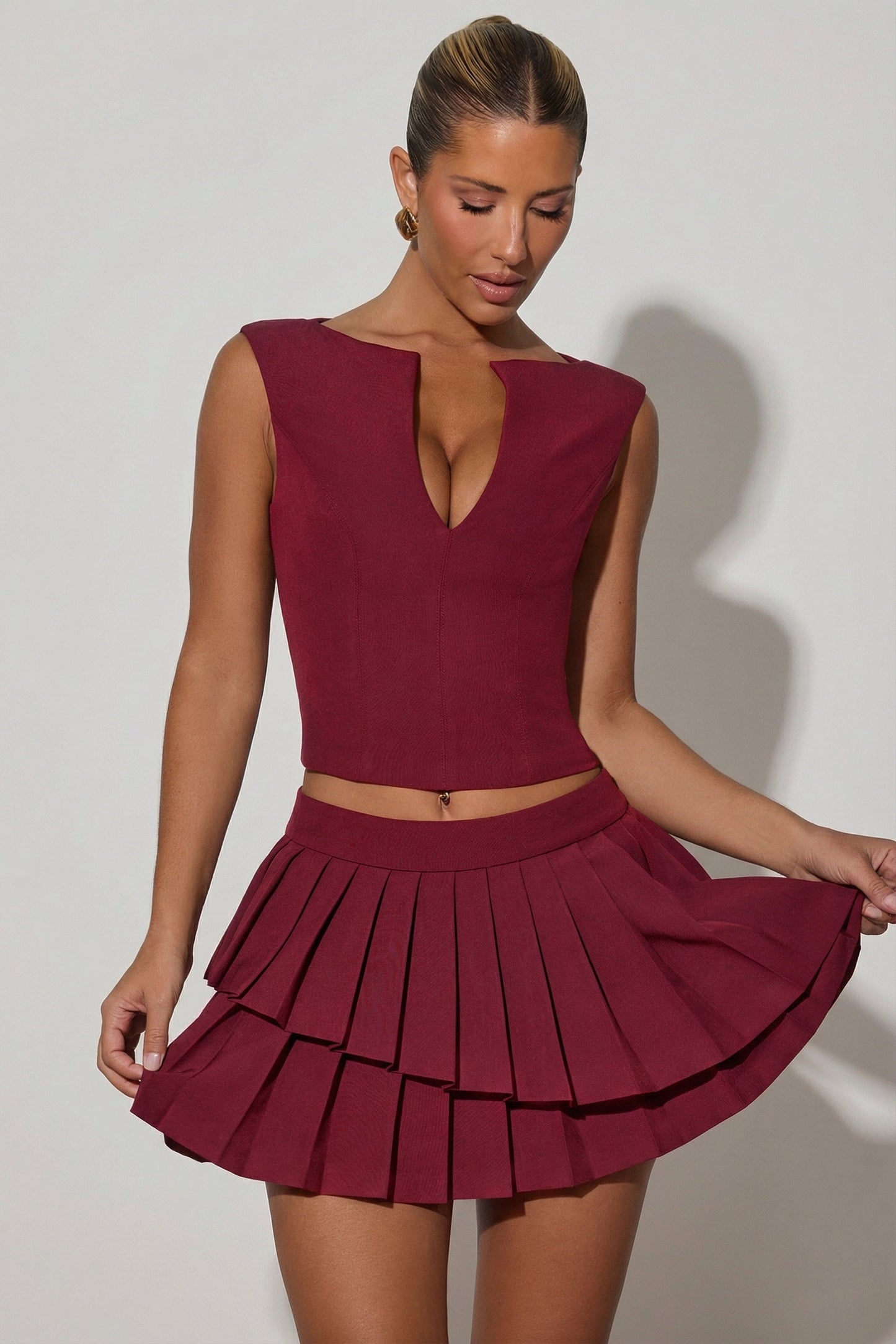 Layered Pleated Low-Rise Mini Skirt in Wine Red